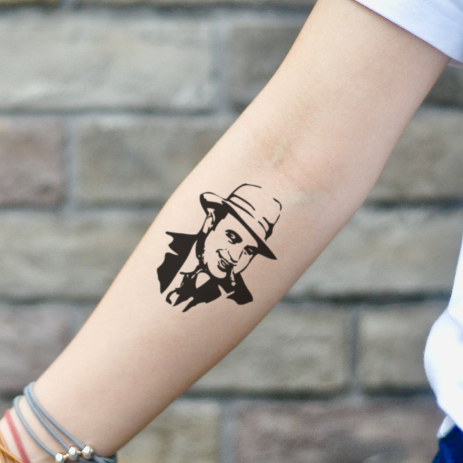 fake small al capone portrait temporary tattoo sticker design idea on inner arm