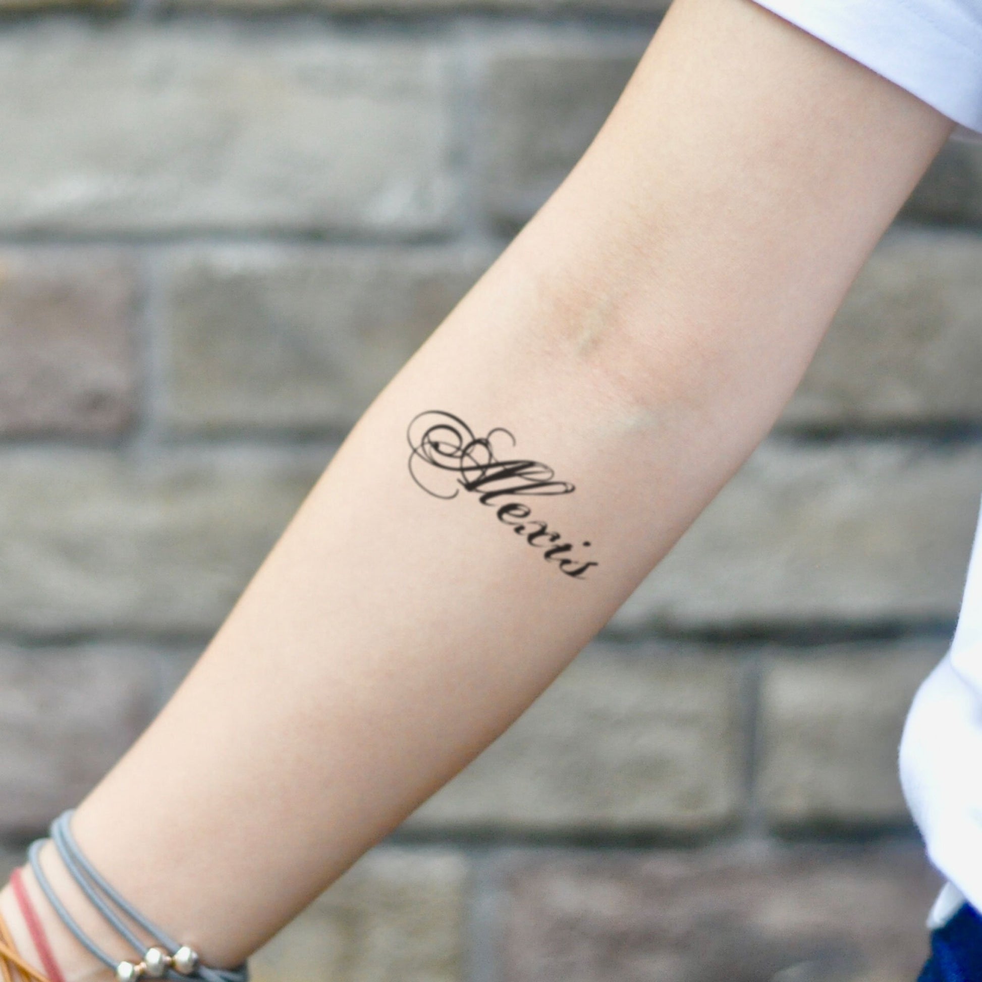 fake small alexis lettering temporary tattoo sticker design idea on inner arm