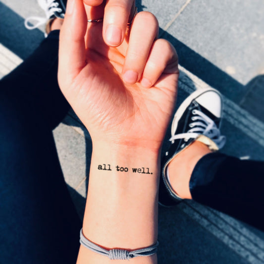 fake small all too well lettering temporary tattoo sticker design idea on wrist