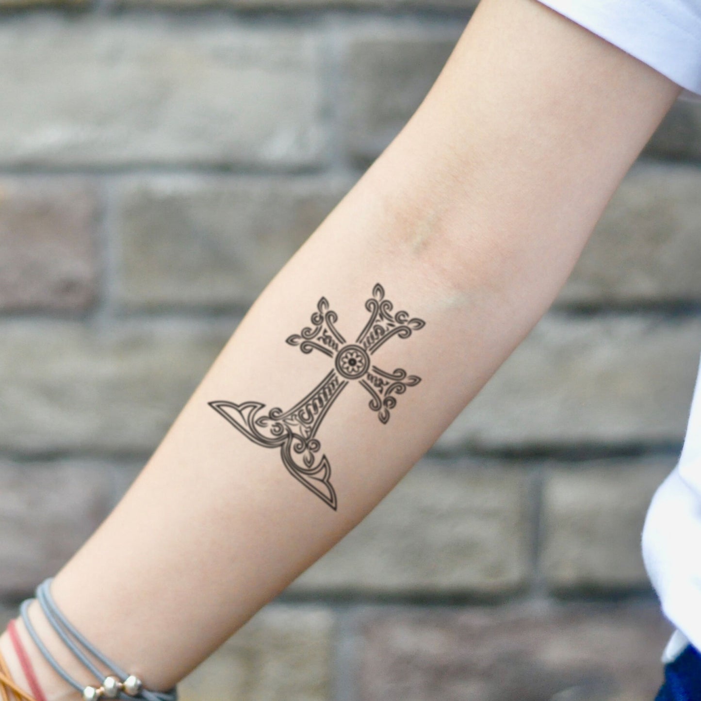 fake small armenian cross illustrative temporary tattoo sticker design idea on inner arm