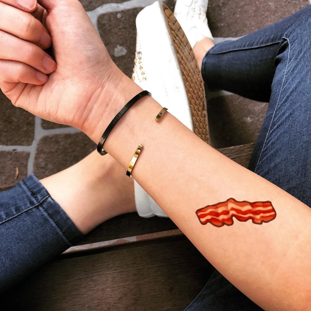 fake small bacon food color temporary tattoo sticker design idea on forearm