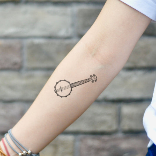 fake small banjo music temporary tattoo sticker design idea on inner arm