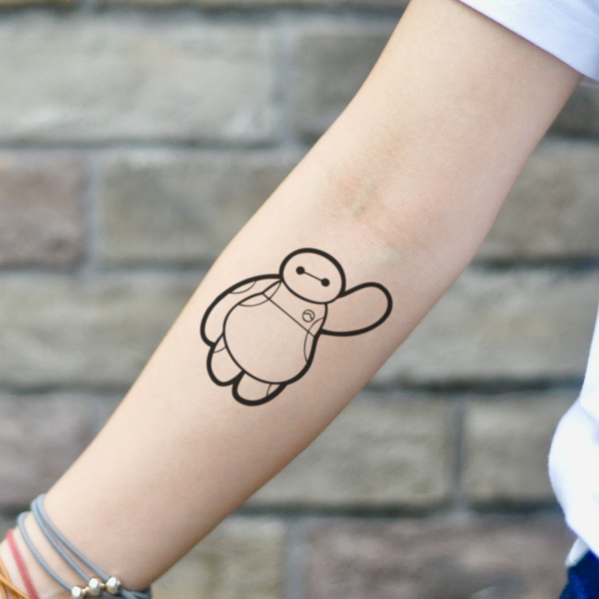 fake small baymax cartoon temporary tattoo sticker design idea on inner arm