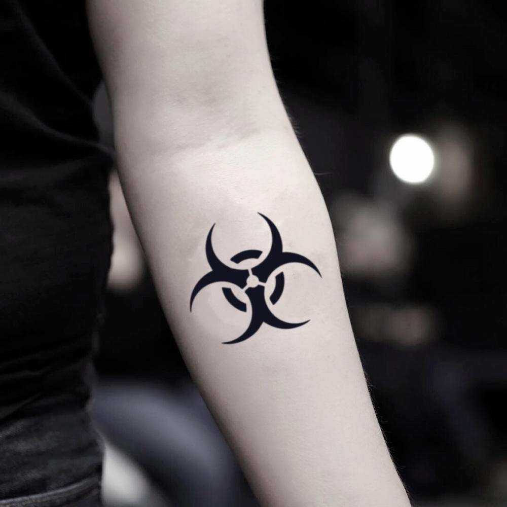 fake small biohazard symbol radioactive hiv positive resident evil geometric temporary tattoo sticker design idea on inner arm