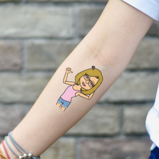 fake small bitmoji cartoon temporary tattoo sticker design idea on inner arm