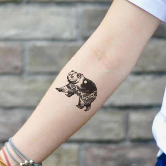 fake small black grizzly bear animal temporary tattoo sticker design idea on inner arm