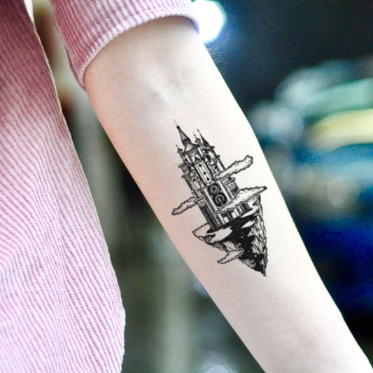 fake small black hogwarts castle kingdom illustrative temporary tattoo sticker design idea on inner arm