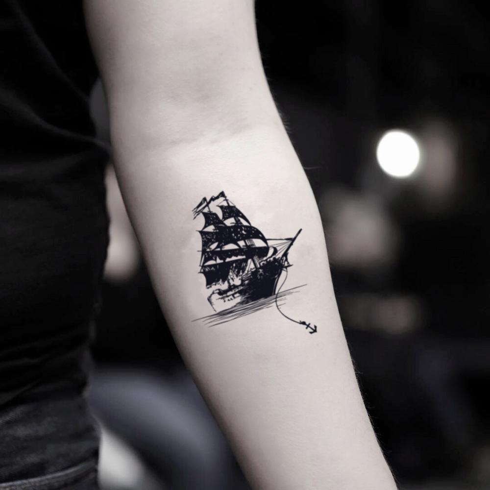 fake small black pearl clipper ghost sailing ship shipwreck homeward bound illustrative temporary tattoo sticker design idea on inner arm