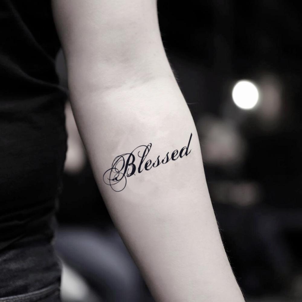 fake small blessed word lettering temporary tattoo sticker design idea on inner arm