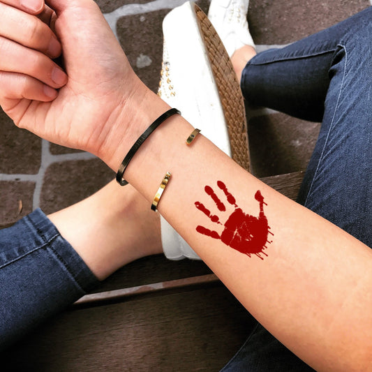 fake small bloody drip color temporary tattoo sticker design idea on forearm