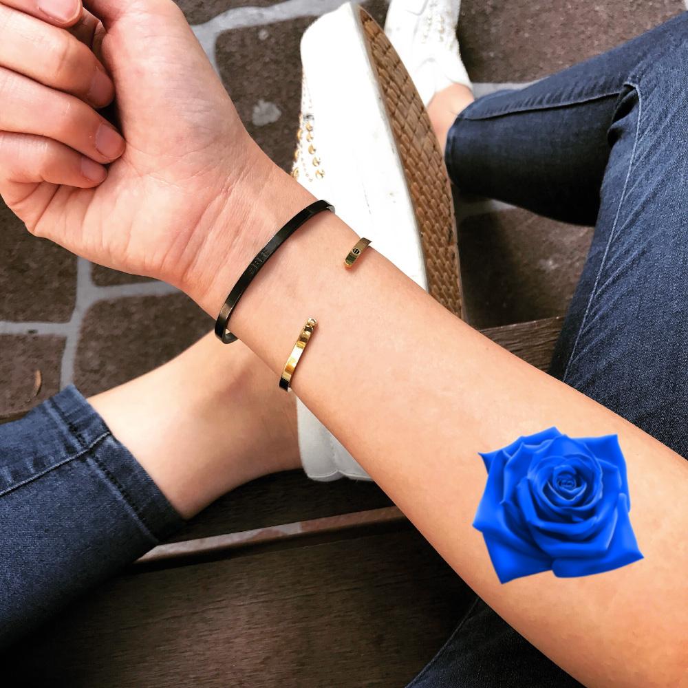 fake small true blue rose flower color temporary tattoo sticker design idea on forearm
