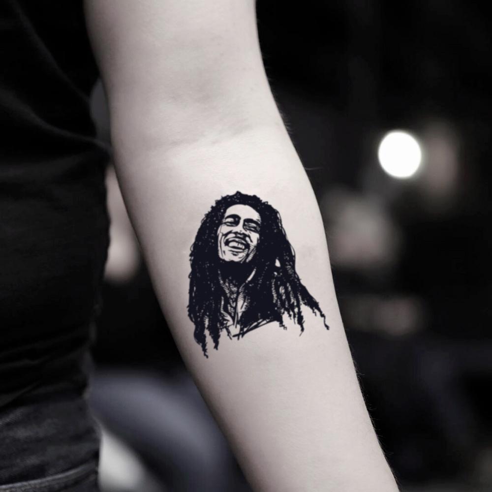 fake small bob marley portrait reggae temporary tattoo sticker design idea on inner arm