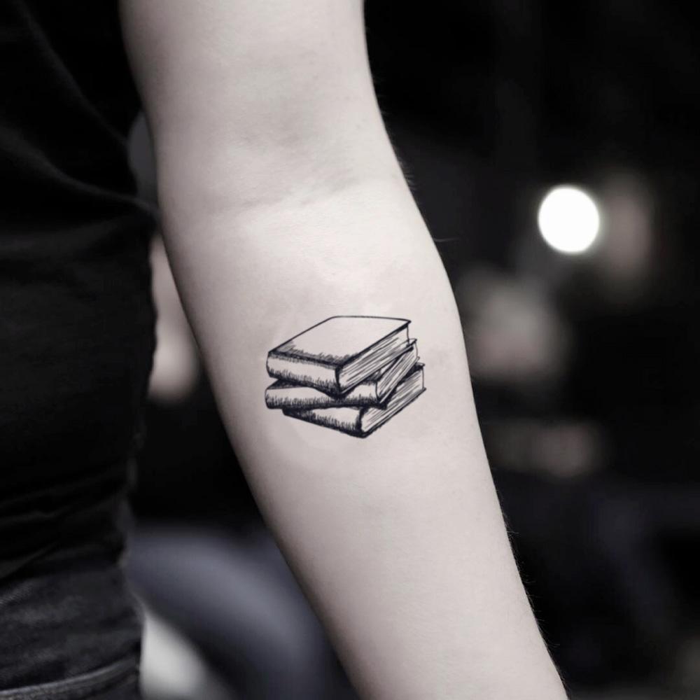 fake small book lover bookworm library teacher illustrative temporary tattoo sticker design idea on inner arm