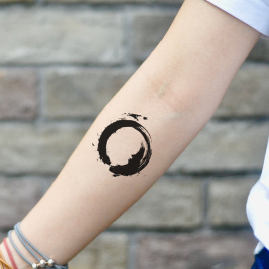 fake small brush stroke taoism watercolor wabi sabi circle zen buddhist geometric temporary tattoo sticker design idea on inner arm