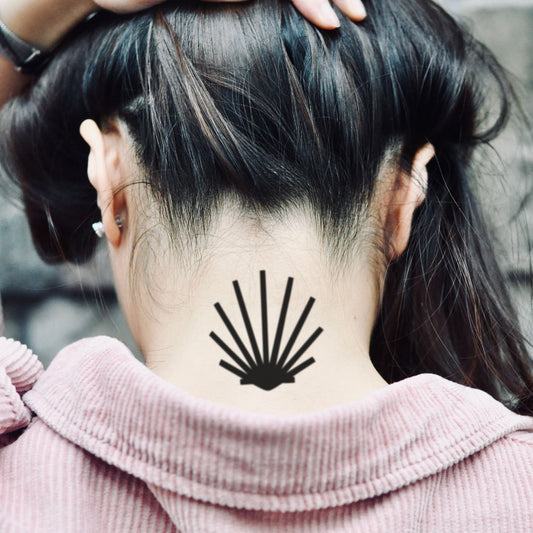 fake small scallop shell camino de santiago symbol minimalist temporary tattoo sticker design idea on neck