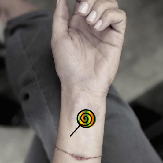 fake small candy food color temporary tattoo sticker design idea on wrist