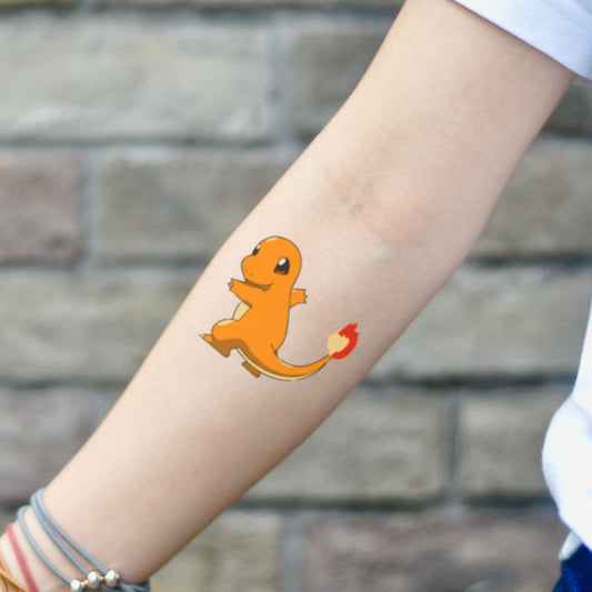 fake small charmander pokemon digimon cartoon temporary tattoo sticker design idea on inner arm