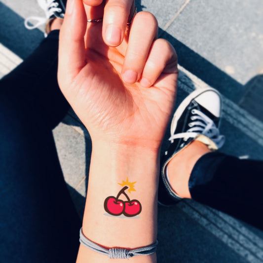 fake small cherry bomb fruit fruity color temporary tattoo sticker design idea on wrist