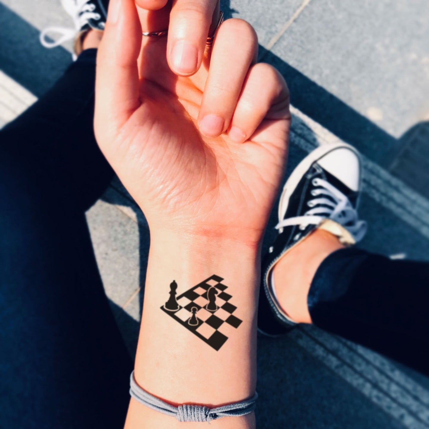 fake small chess board illustrative temporary tattoo sticker design idea on wrist