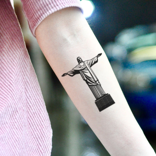 fake small christ the redeemer illustrative temporary tattoo sticker design idea on inner arm