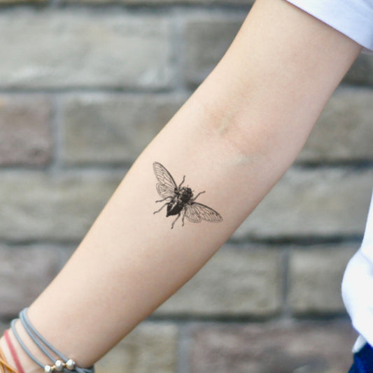 fake small cicada animal temporary tattoo sticker design idea on inner arm