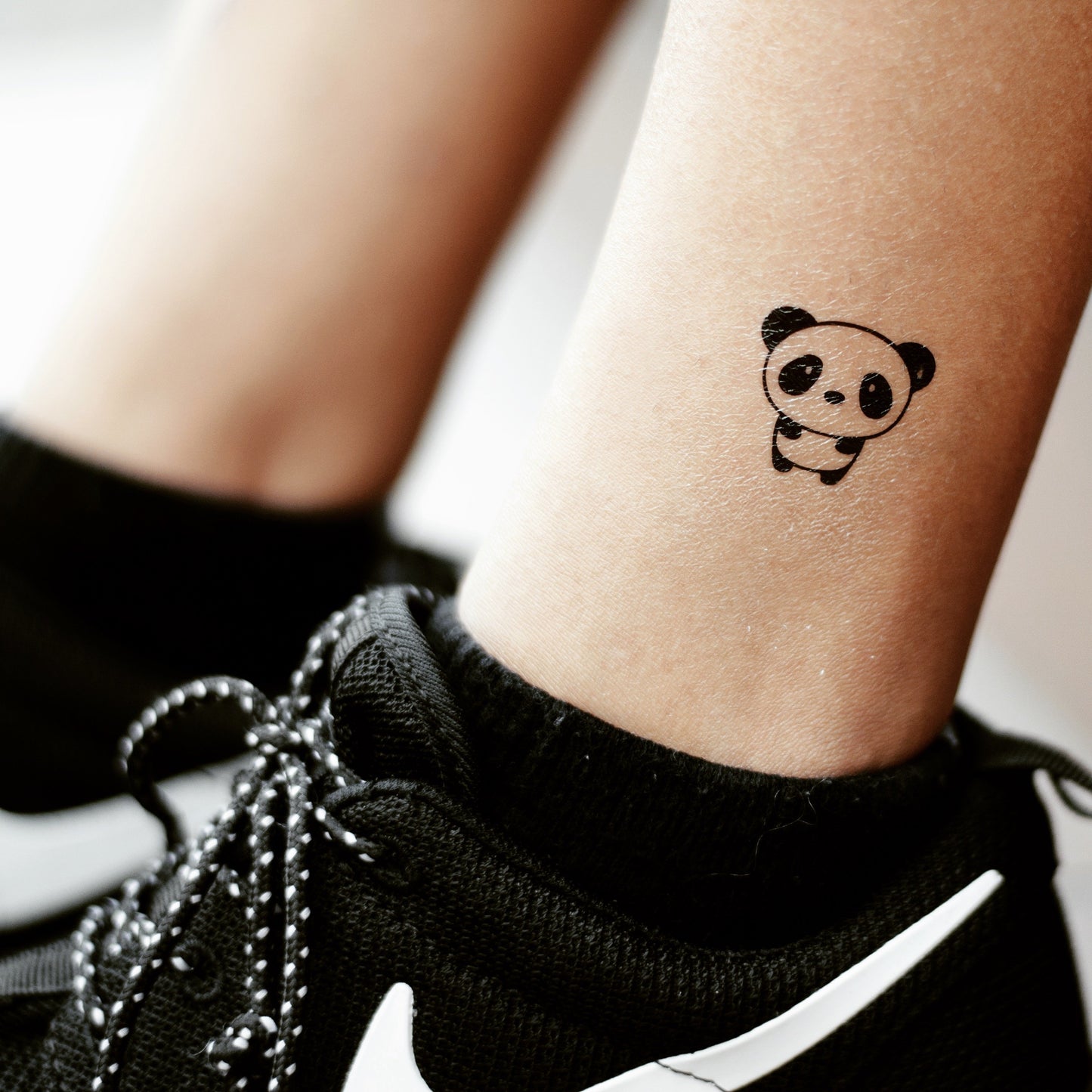 fake small cute kawaii cartoon panda animal temporary tattoo sticker design idea on ankle