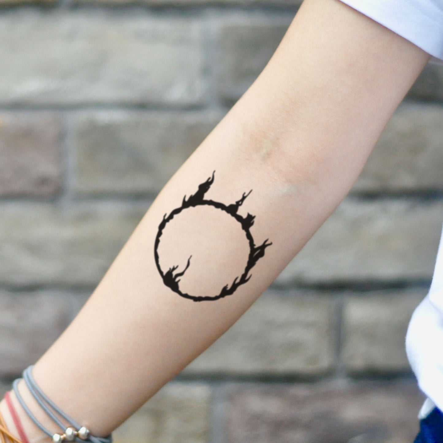 fake small dark souls 3 dark sign Minimalist temporary tattoo sticker design idea on inner arm