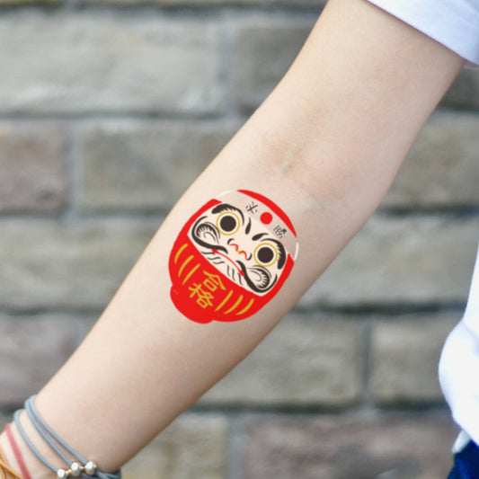 fake small daruma doll Color temporary tattoo sticker design idea on inner arm