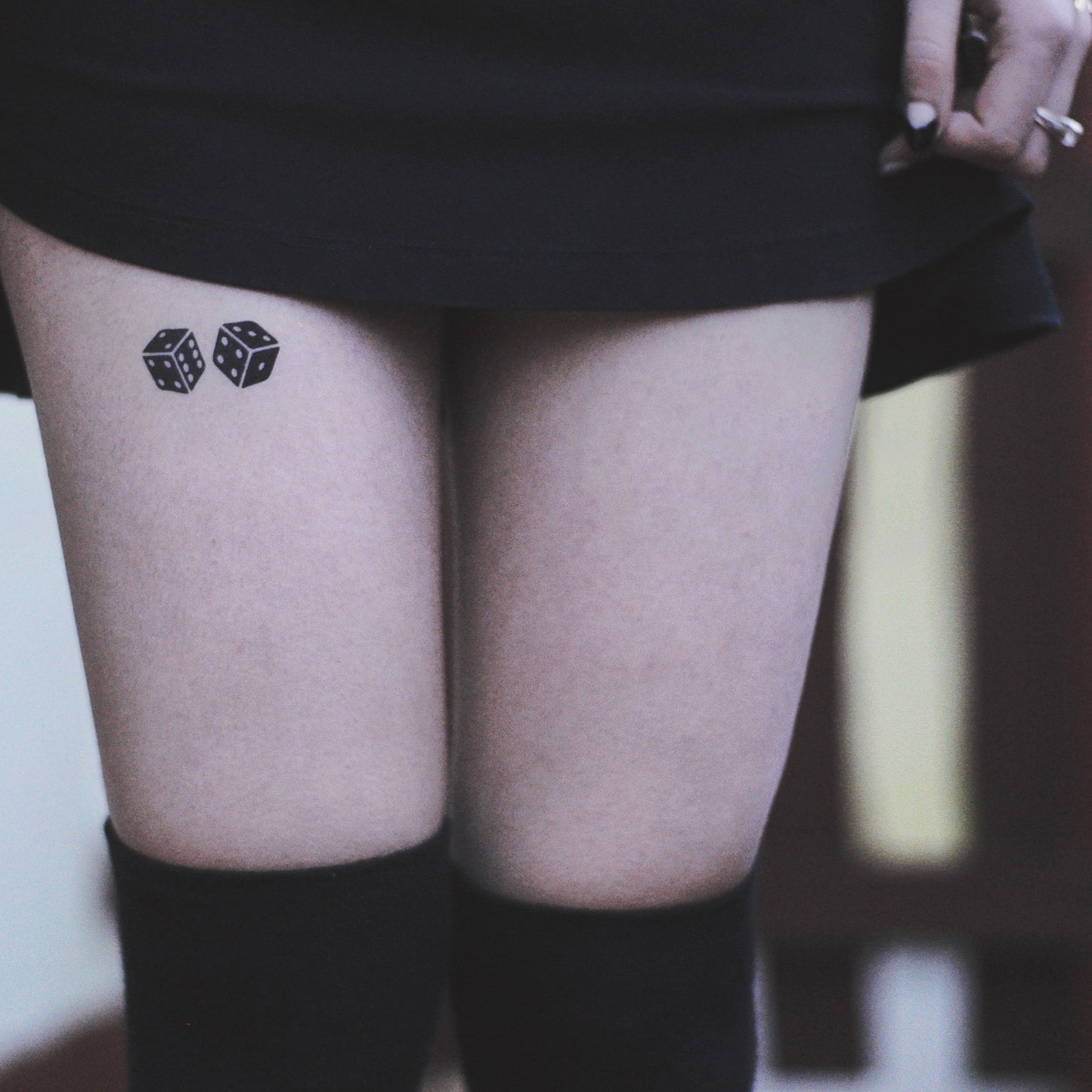 fake small dices minimalist temporary tattoo sticker design idea on thigh