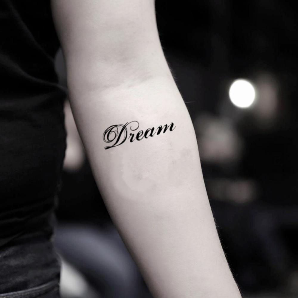 fake small dream lettering temporary tattoo sticker design idea on inner arm