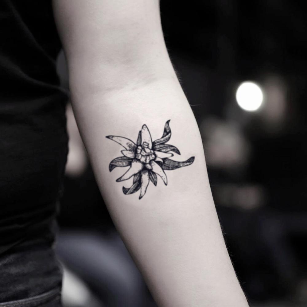 fake small edelweiss flower temporary tattoo sticker design idea on inner arm