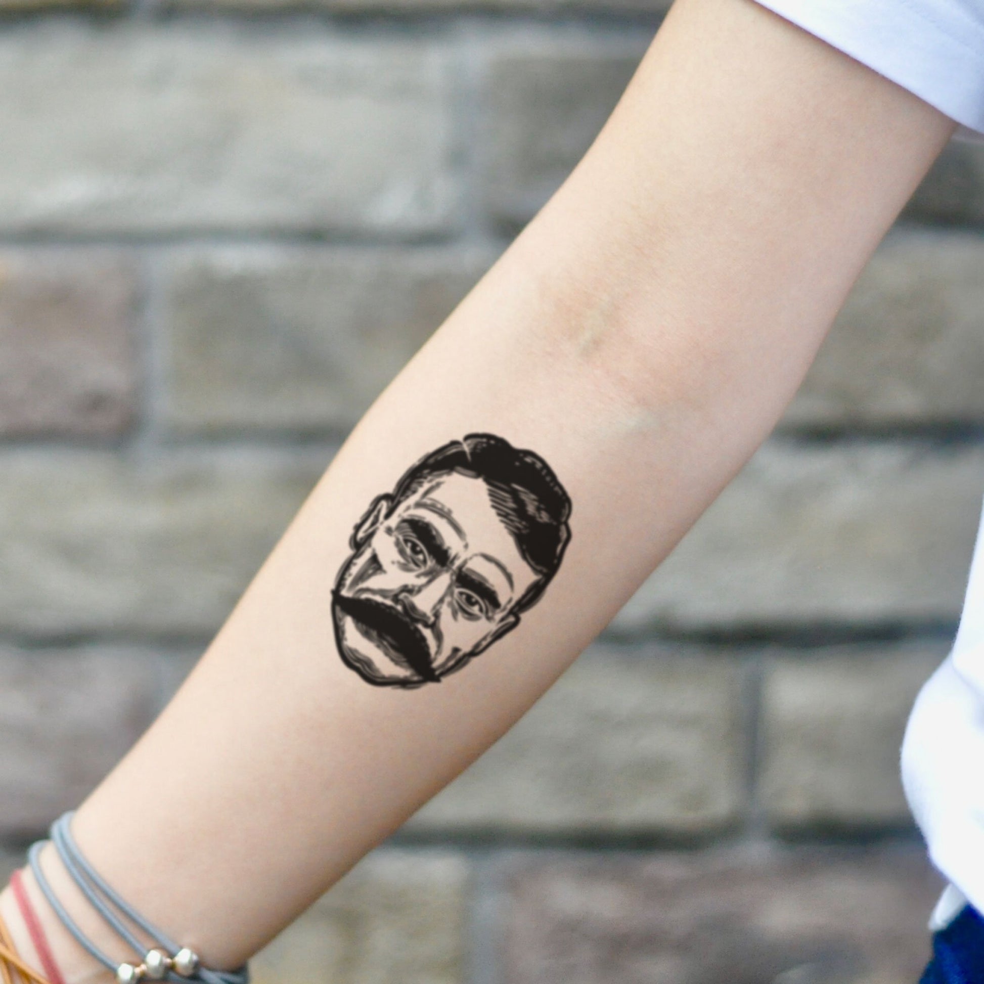 fake small emiliano zapata portrait temporary tattoo sticker design idea on inner arm