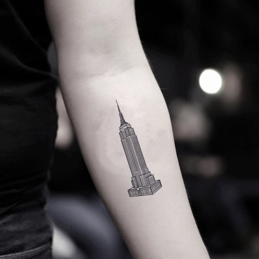 fake small empire state building illustrative temporary tattoo sticker design idea on inner arm