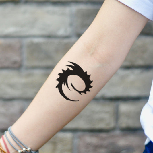 fake small eragon minimalist temporary tattoo sticker design idea on inner arm