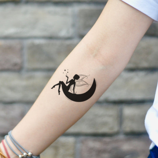 fake small fairy moon illustrative temporary tattoo sticker design idea on inner arm
