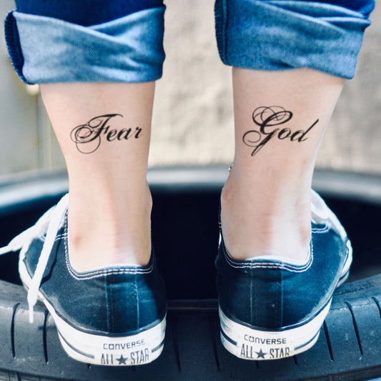 fake small fear god lettering temporary tattoo sticker design idea on ankle
