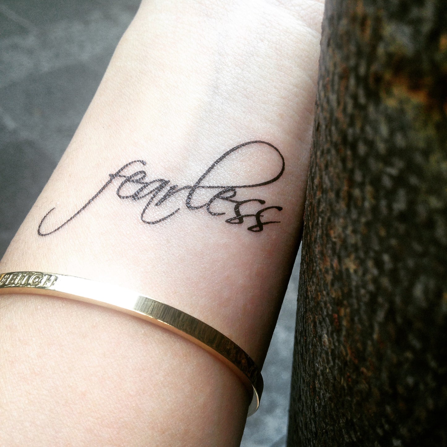 Small Fearless custom lettering signature temporary tattoo design idea on wrist - custom word name font writing characters calligraphy quote - OhMyTat