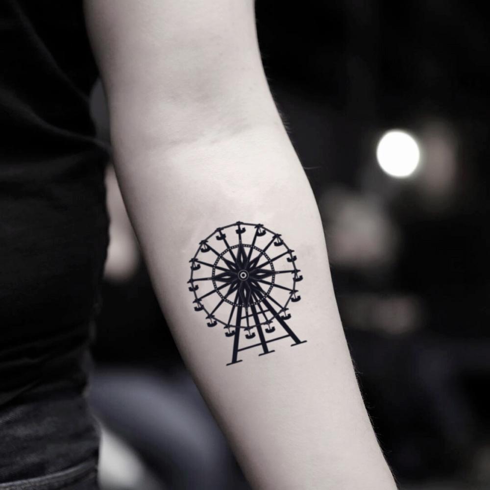 fake small ferris wheel illustrative temporary tattoo sticker design idea on inner arm