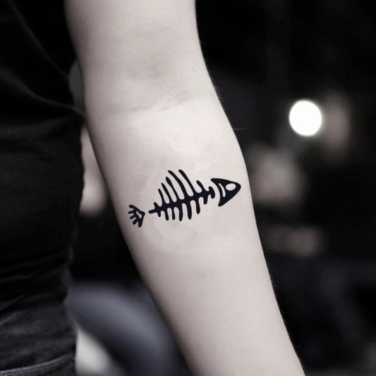 fake small dead fish bone skeleton whang od animal temporary tattoo sticker design idea on inner arm