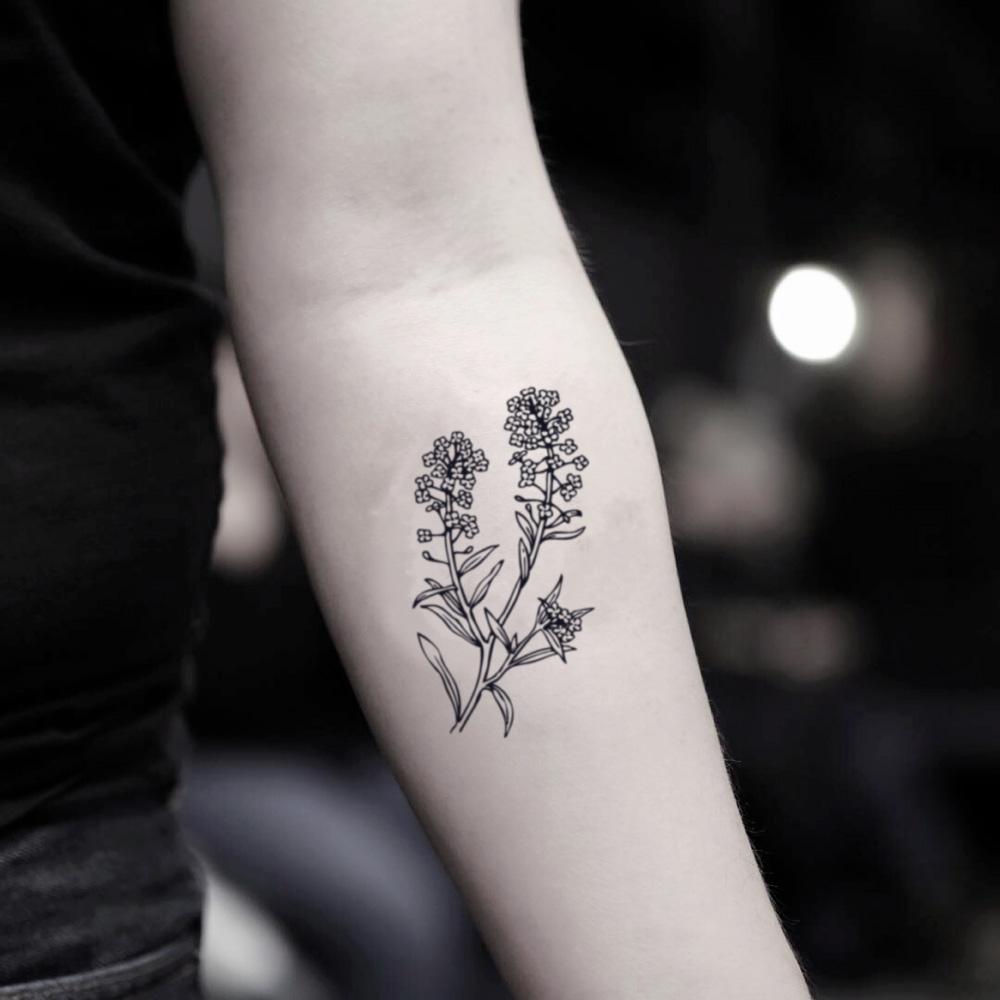 fake small forget me not flower temporary tattoo sticker design idea on inner arm