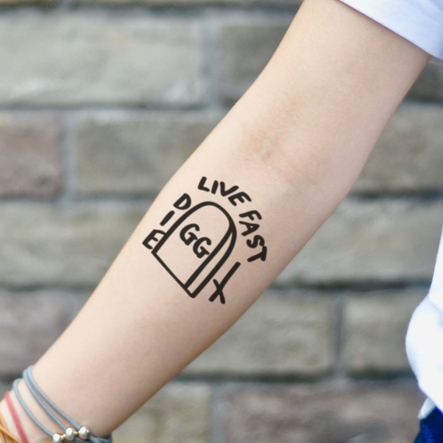 fake small gg allin live fast die illustrative temporary tattoo sticker design idea on inner arm