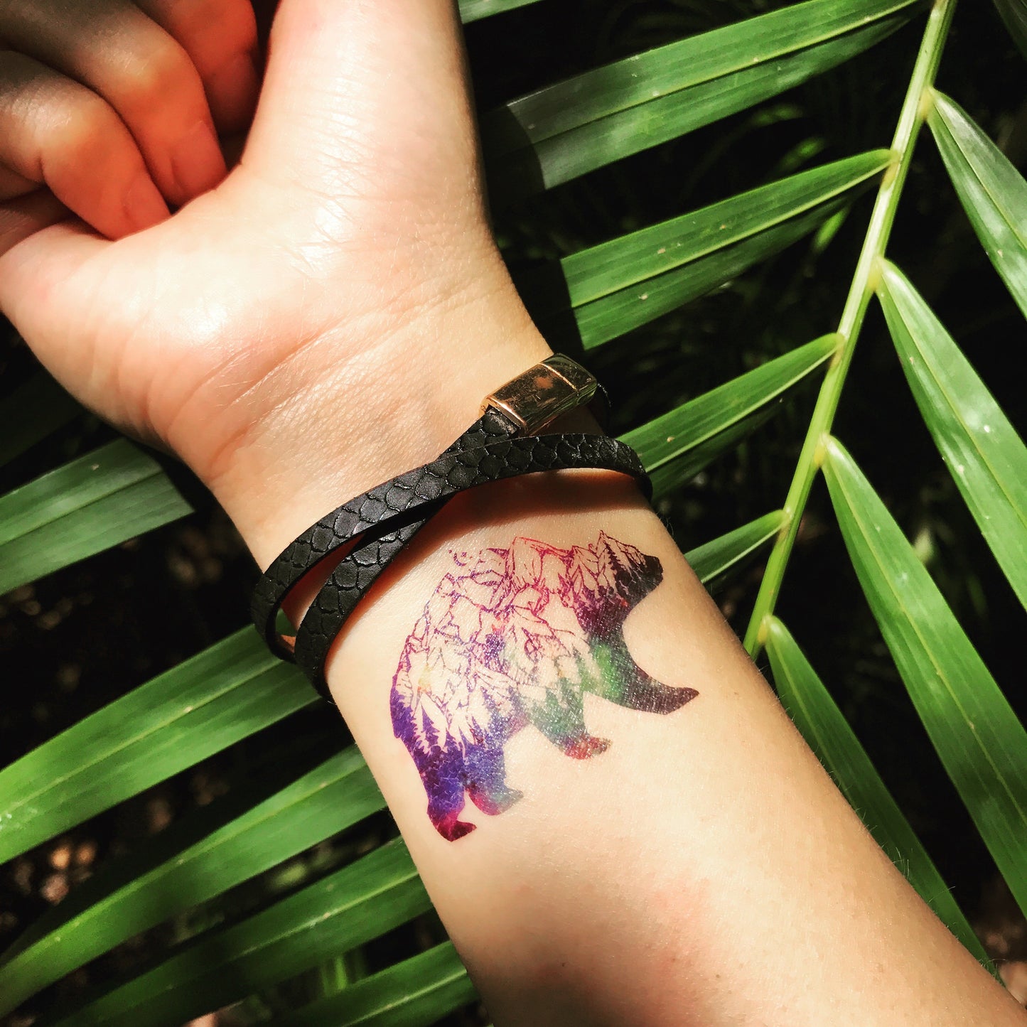 fake small galaxy polar bear color animal temporary tattoo sticker design idea on wrist