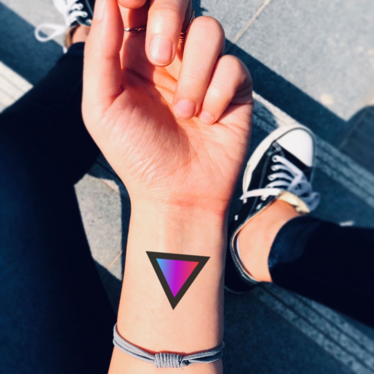 fake small gay triangle rainbow color lgbt pride symbol geometric temporary tattoo sticker design idea on wrist