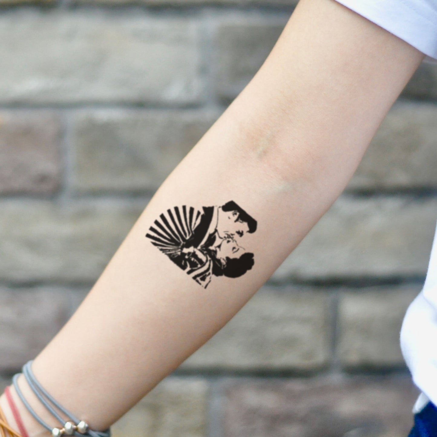 fake small gone with the wind illustrative temporary tattoo sticker design idea on inner arm