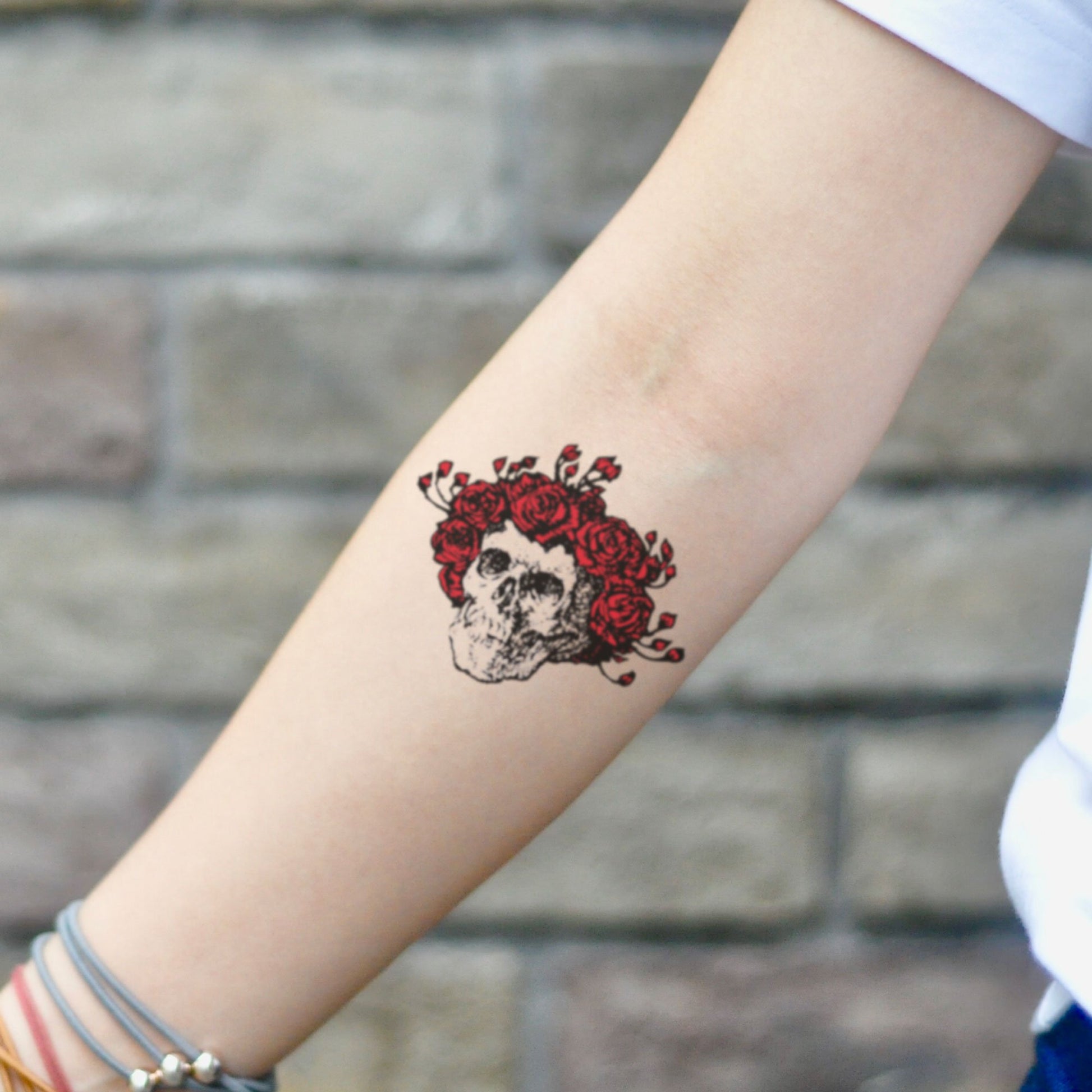 fake small grateful dead bertha cartoon temporary tattoo sticker design idea on inner arm