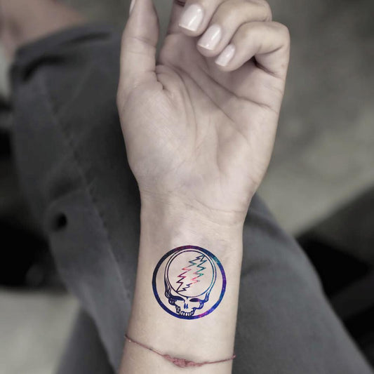 fake small grateful dead head steal your face galaxy color temporary tattoo sticker design idea on wrist