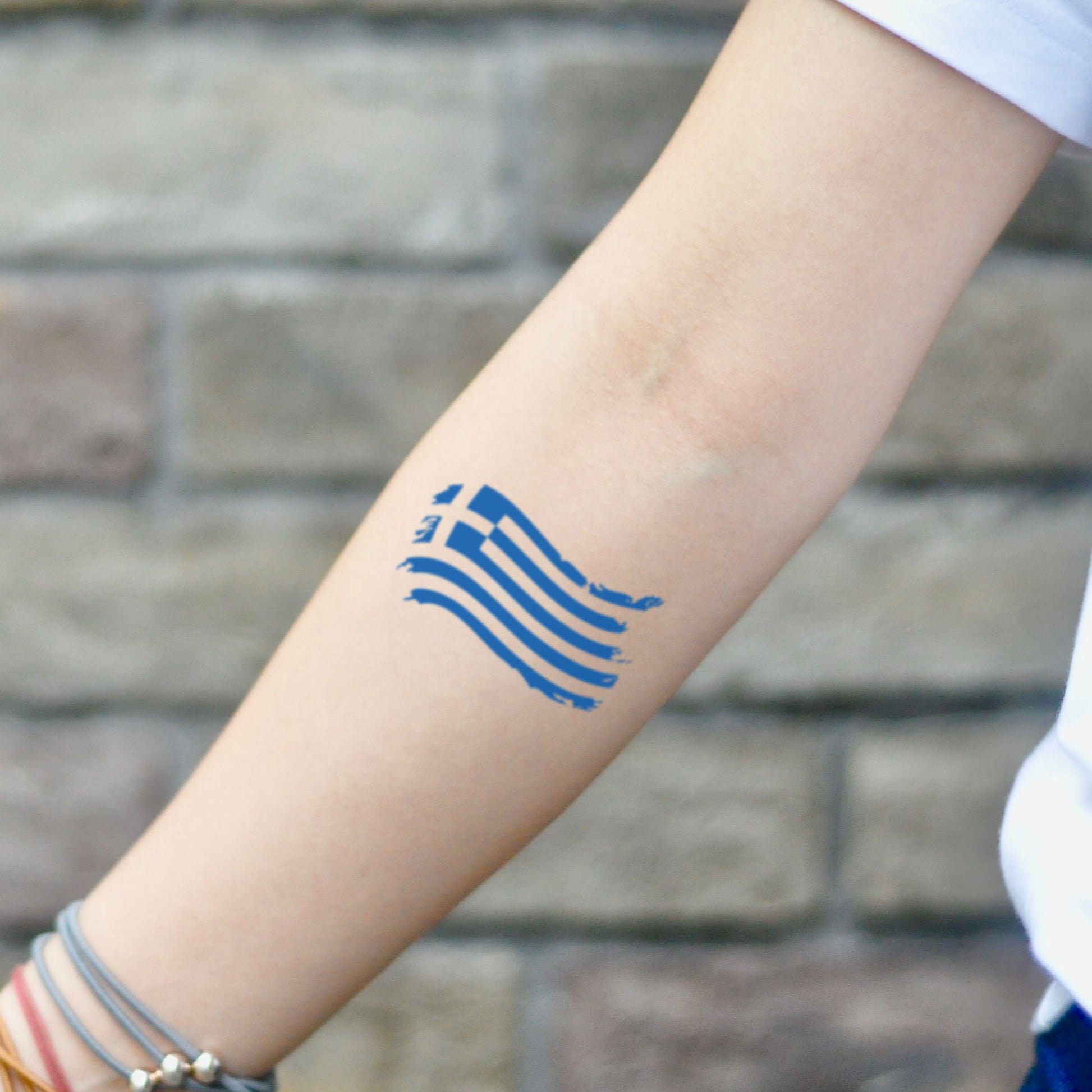 fake small greek flag color temporary tattoo sticker design idea on inner arm