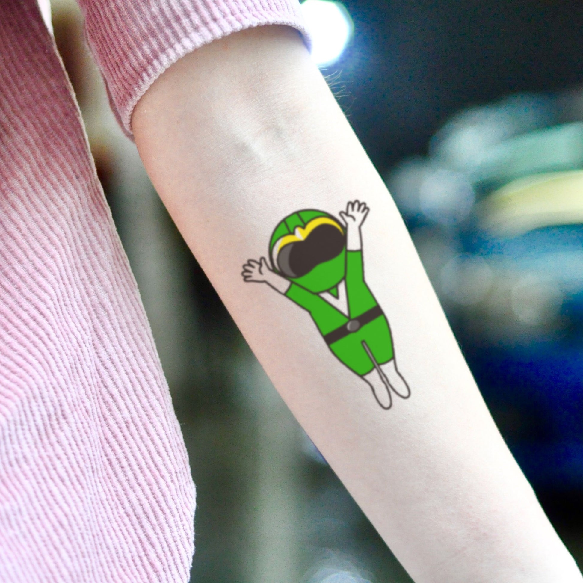 fake small green power ranger color temporary tattoo sticker design idea on inner arm