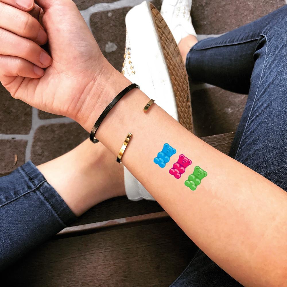 fake small gummy bear color food temporary tattoo sticker design idea on forearm