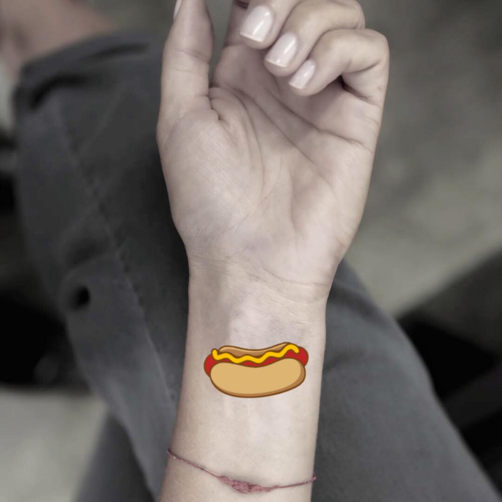fake small hot dog food color temporary tattoo sticker design idea on wrist